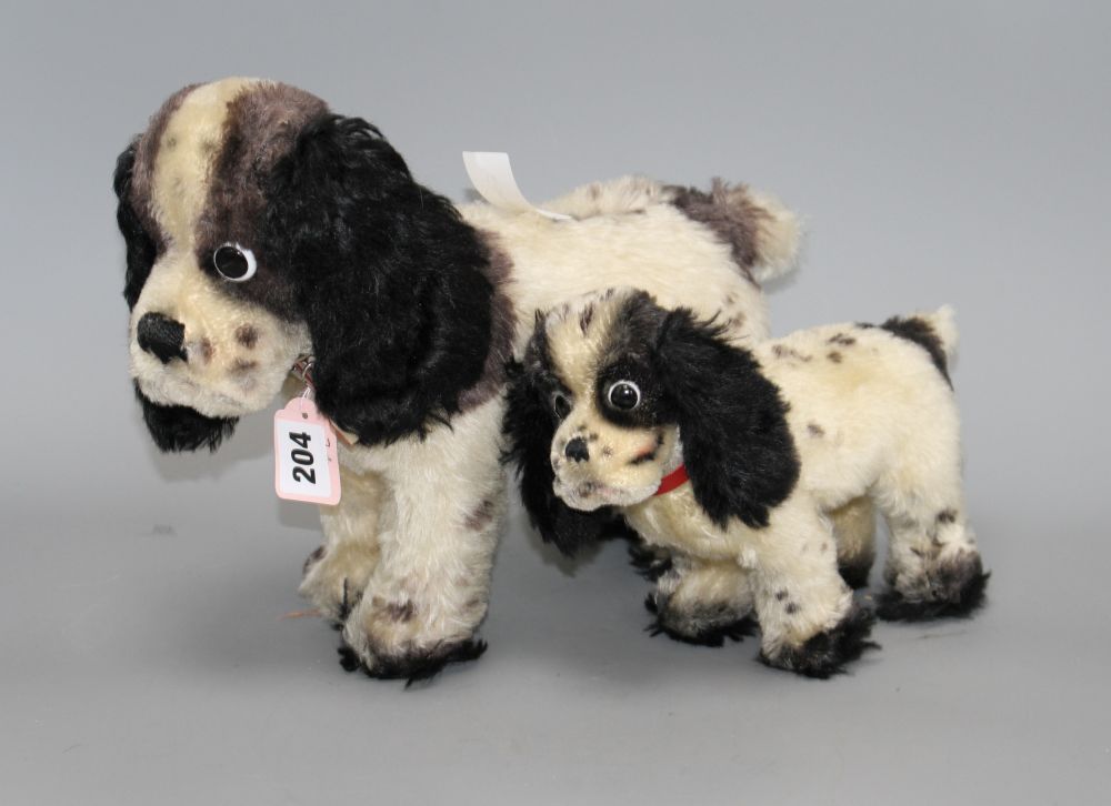 Two 1950s Steiff Cockie dogs, 33cm and 22cm